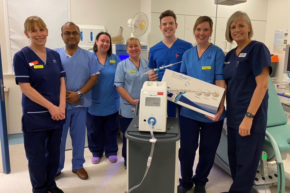 (from left to right): Senior Charge Nurse Janet Harrats, Mr Nibs Biswas; Staff Nurse Linda Gordon, Nursing Assistant Claire Wallace, Dr Iain Martin, Staff Nurse Aynslie Dale and Gillian Shearer from Hologic.