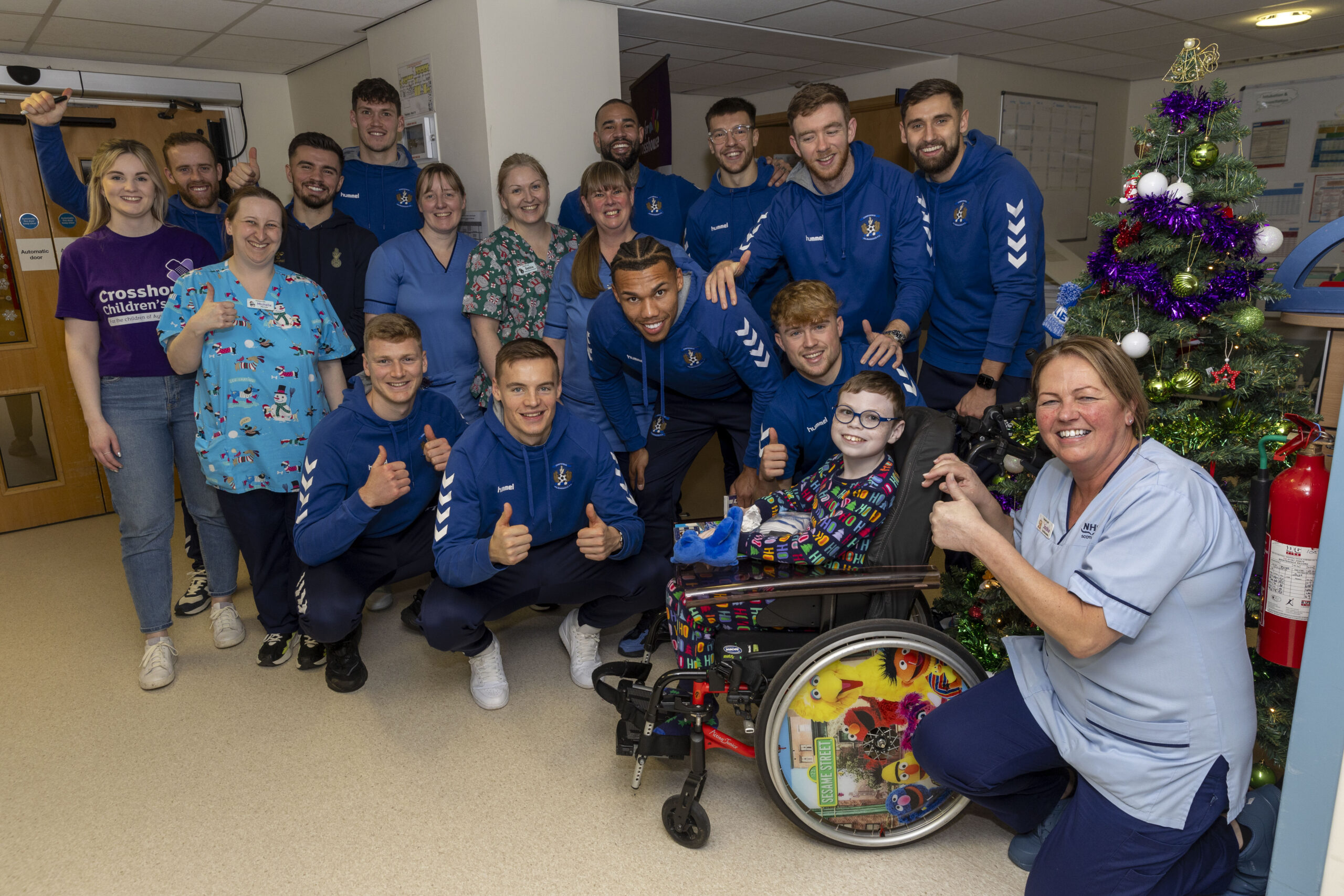 Players from Kilmarnock Football club for a festive visit to Children's Ward