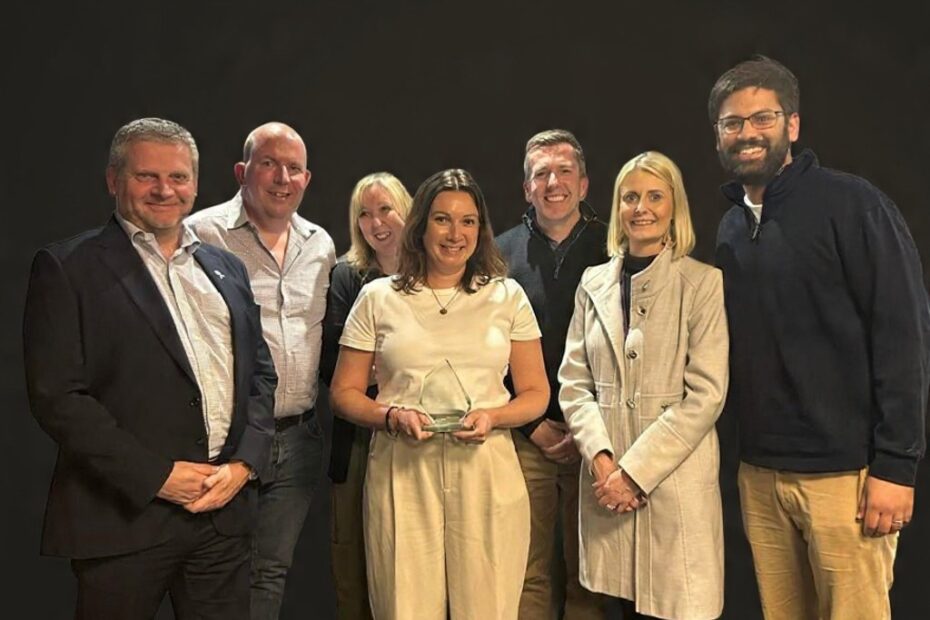 Group of people receiving an award