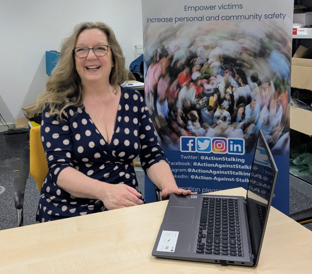 Hayley Tennant, Action Against Stalking Chief Executive with new IT equipment donated by Medica