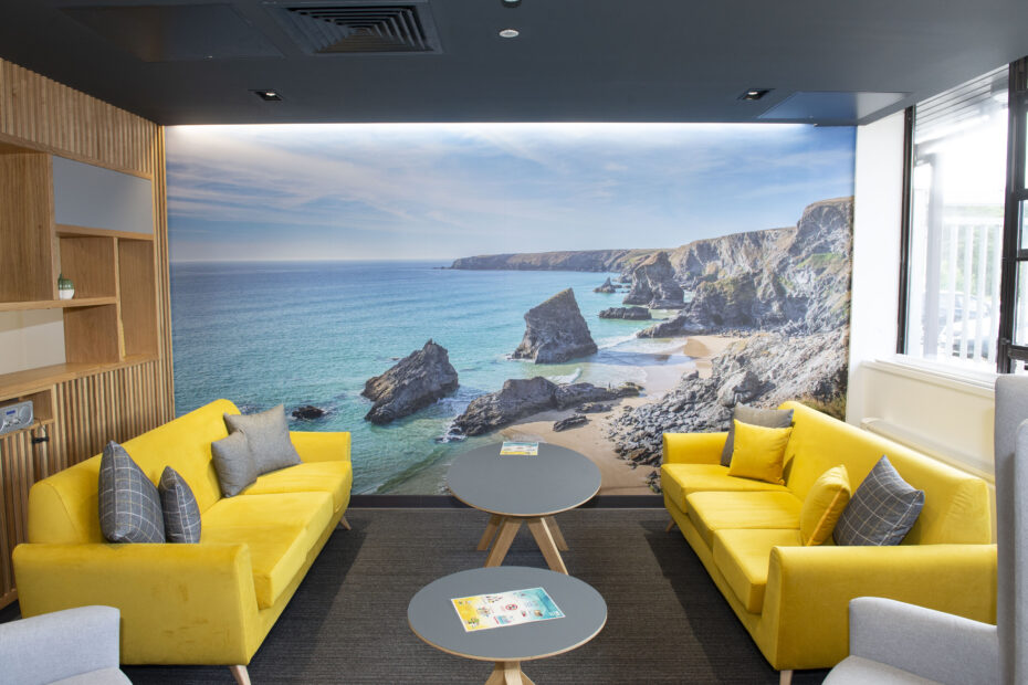 Room at one the wellbeing centres, showing two couches with scenic backdrop where staff can come and relax.