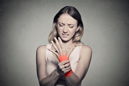 Woman with CRPS pain in hand